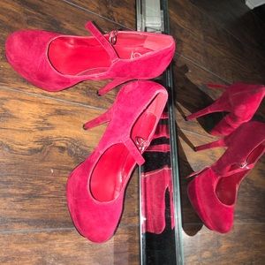 Red heel pumps